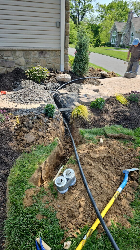 Newtown irrigation repair. Avoided tearing up stairs and stopped leak further up the walk