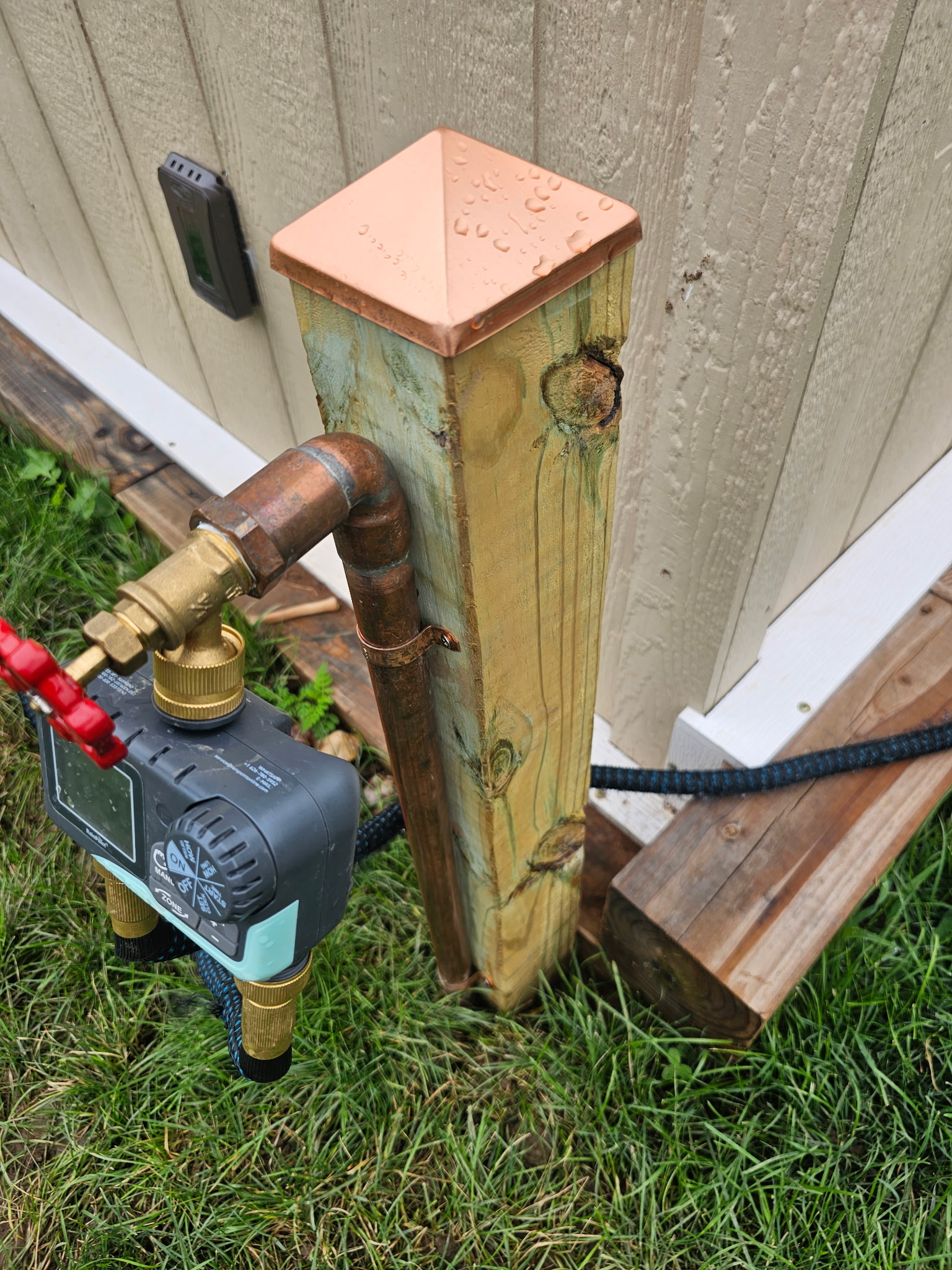 New Irrigation install-added copper spigot and post with copper post cap