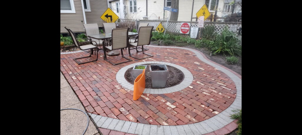 Curvy custom patio with space for tree